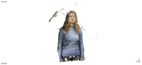 a woman in a blue shirt is standing in front of a black background